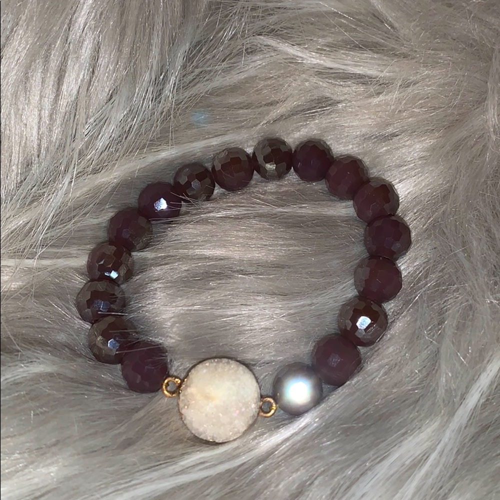 Purple beaded bracelet with white natural stone